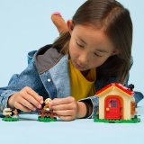 LEGO® Animal Crossing™ 77058 Goldie a její útulný dům